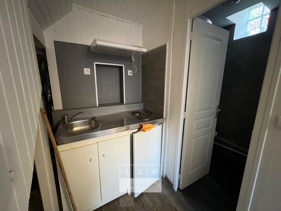 Maison divisée en 3 logements