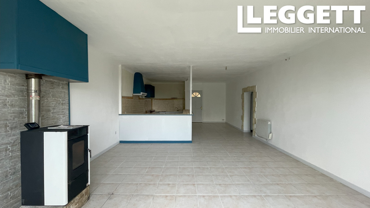 Un immeuble avec 3 grands appartements avec la vue sur les Pyrénées, un grand garage et terrain de 2811m2