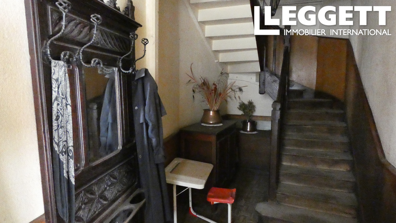 Ancien commerce avec deux étages pour projet d'habitation, de location et d'investissement