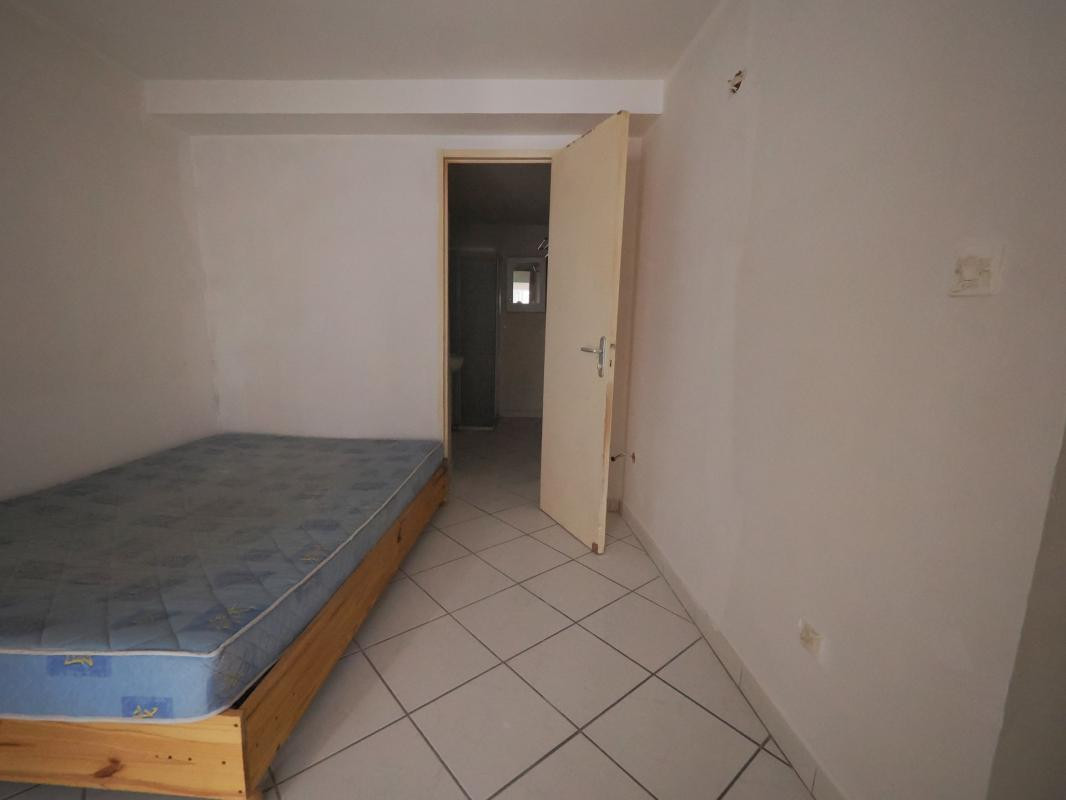 A VENDRE A DIGNE LES BAINS LOT DE 15 APPARTMENTS DONT 8 A RENOVER , PLEIN CENTRE VILLE