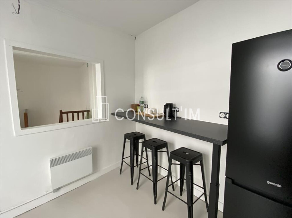 Bureaux avec double accès, pierres apparantes - Quartier de Jussieu
