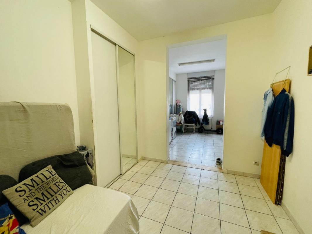 Immeuble : 1 studio et 4 chambres en meublé - BETHUNE