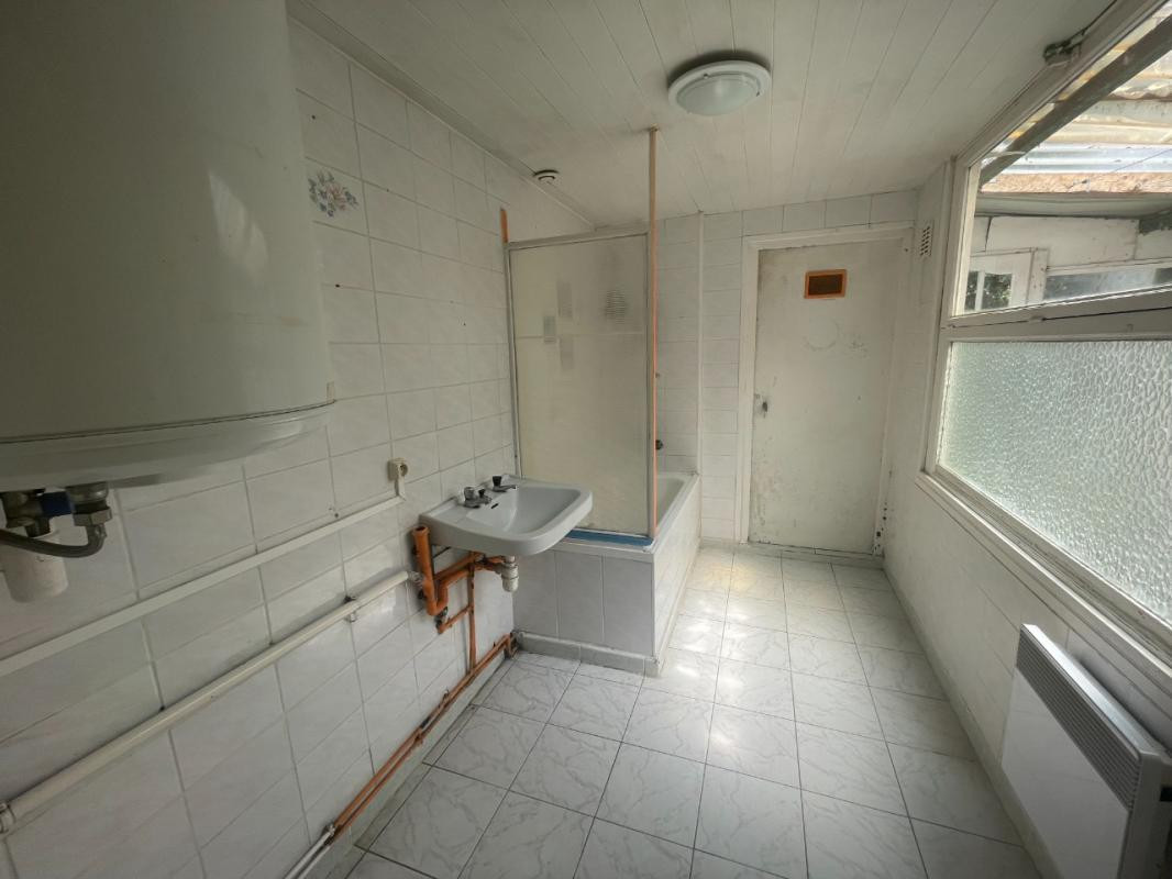 Immeuble de rapport contenant 4 lots