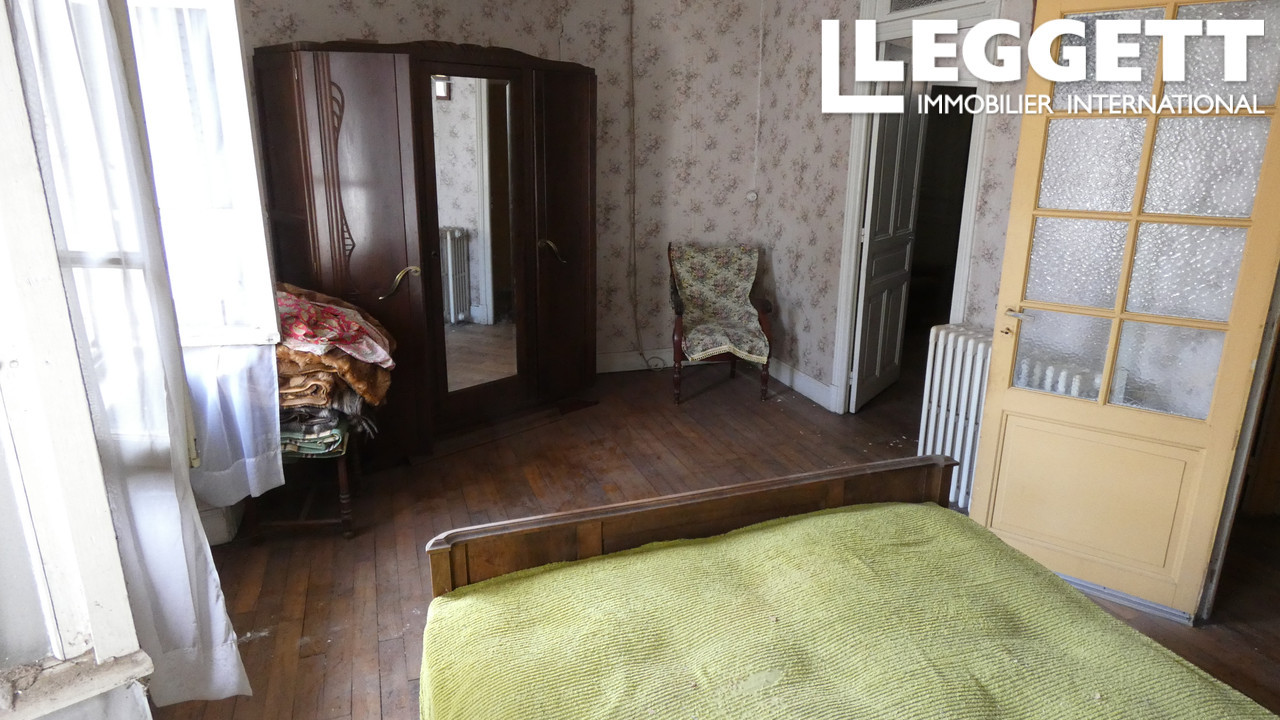 Ancien commerce avec deux étages pour projet d'habitation, de location et d'investissement