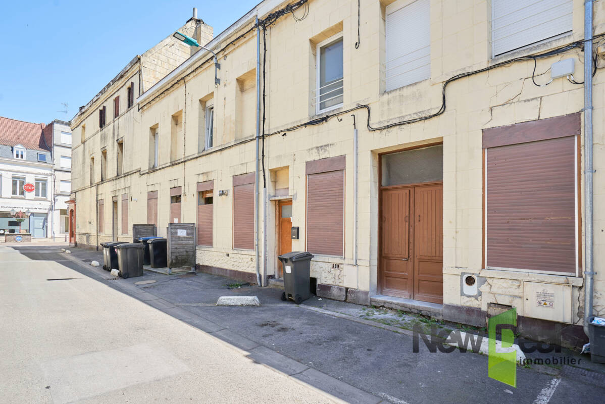 immeuble commercial + appartements à rénover