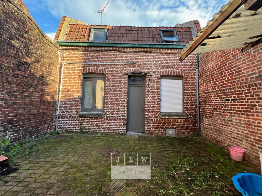 Maison divisée en 3 logements