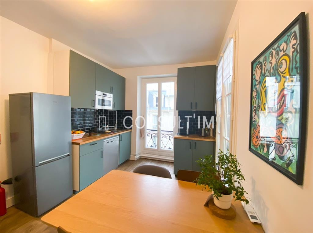 A louer bureaux lumineux et climatisés avec parquet, moulures, cheminées, balcon filant