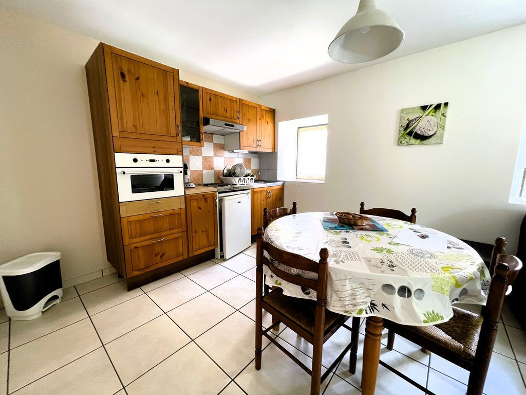 Propriété composée de 4 appartements + Terrain + Garage