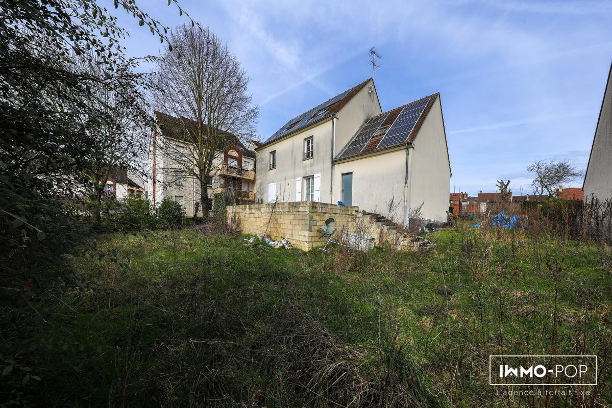 Immeuble de 340m² en R+3 + jardin située à Clermont