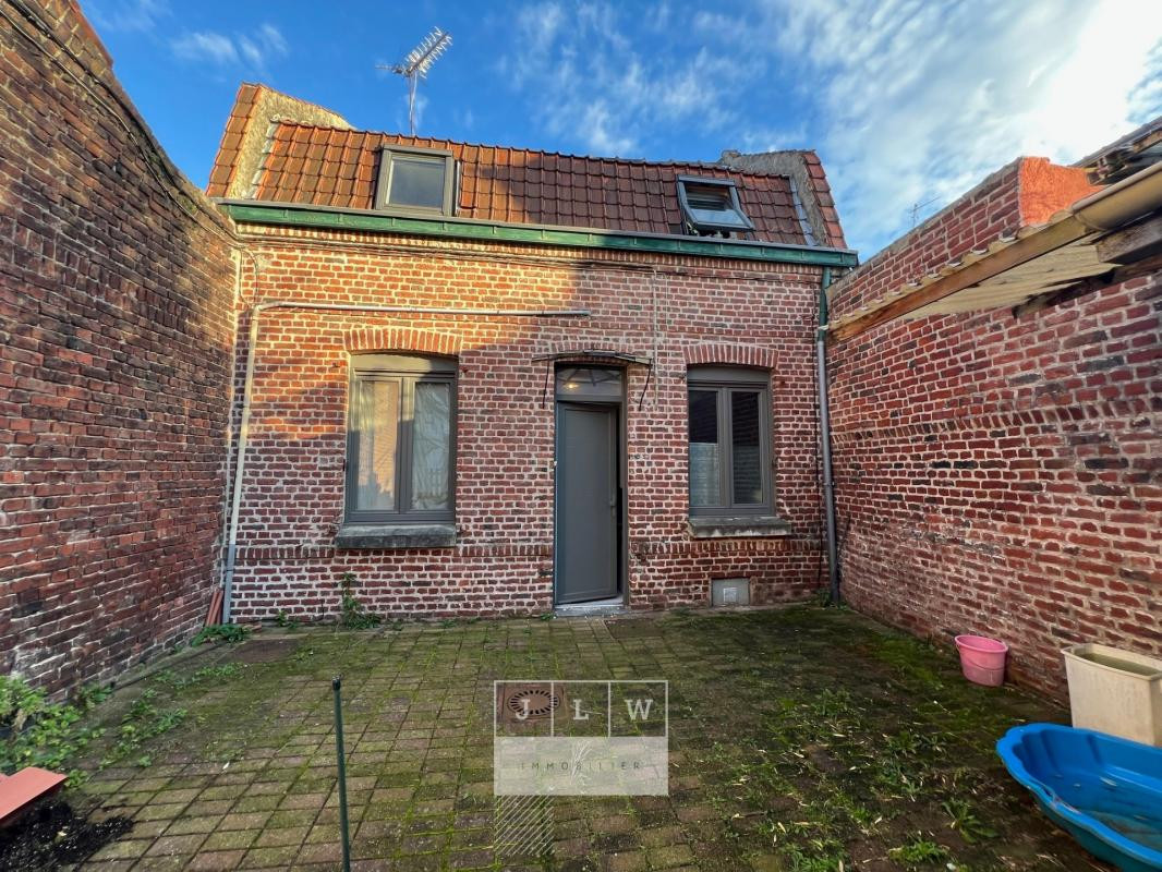 Maison divisée en 3 logements