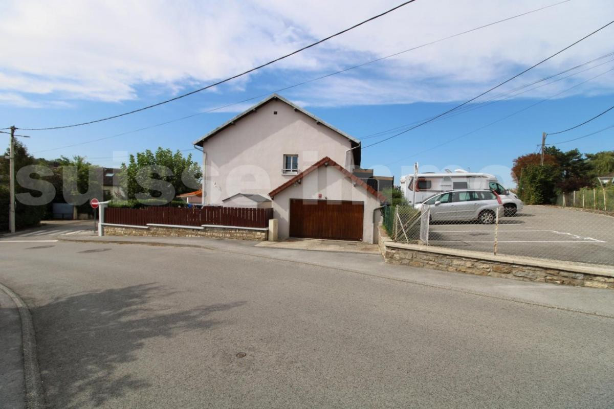 Immeuble - 370.69 m2 - 4 appartements - terrain d'environ 25 ares constructibles