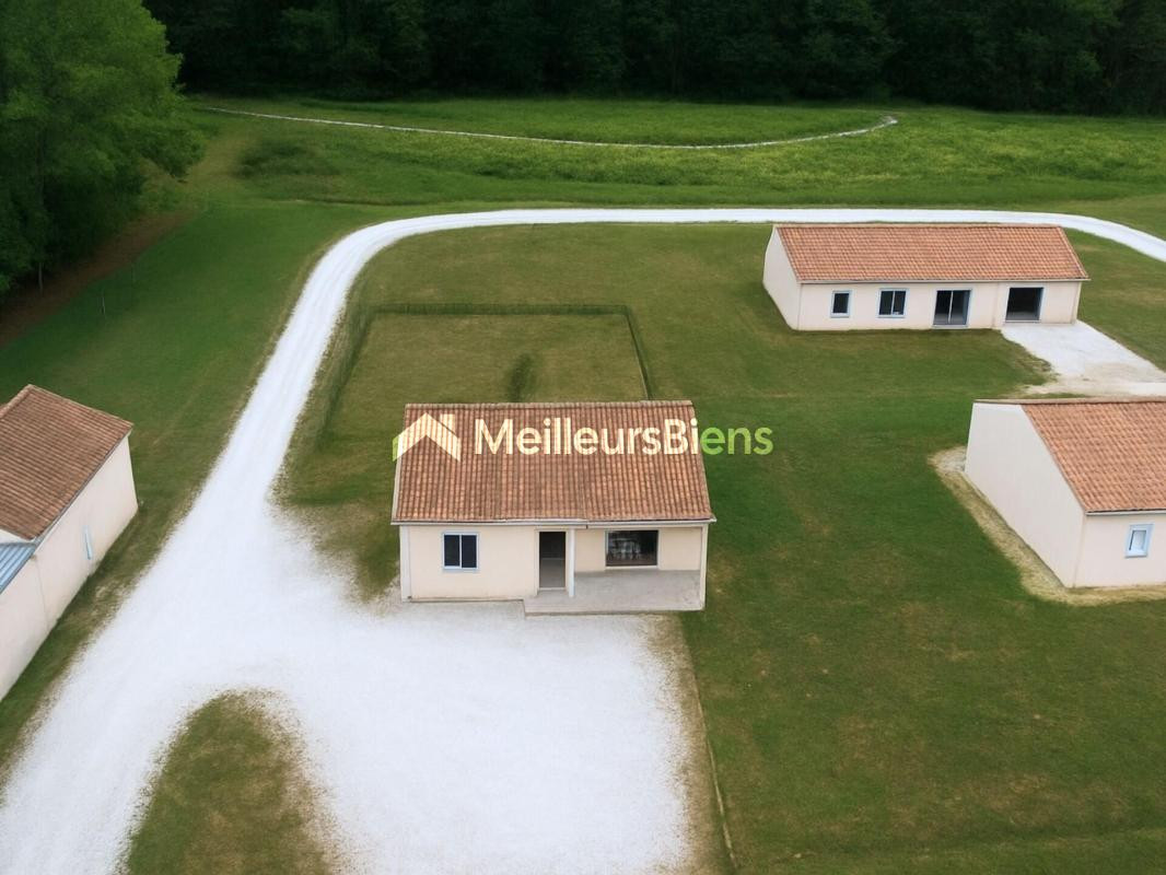 Maison et/ou local professionnel – Construction récente avec jardin – Douville
