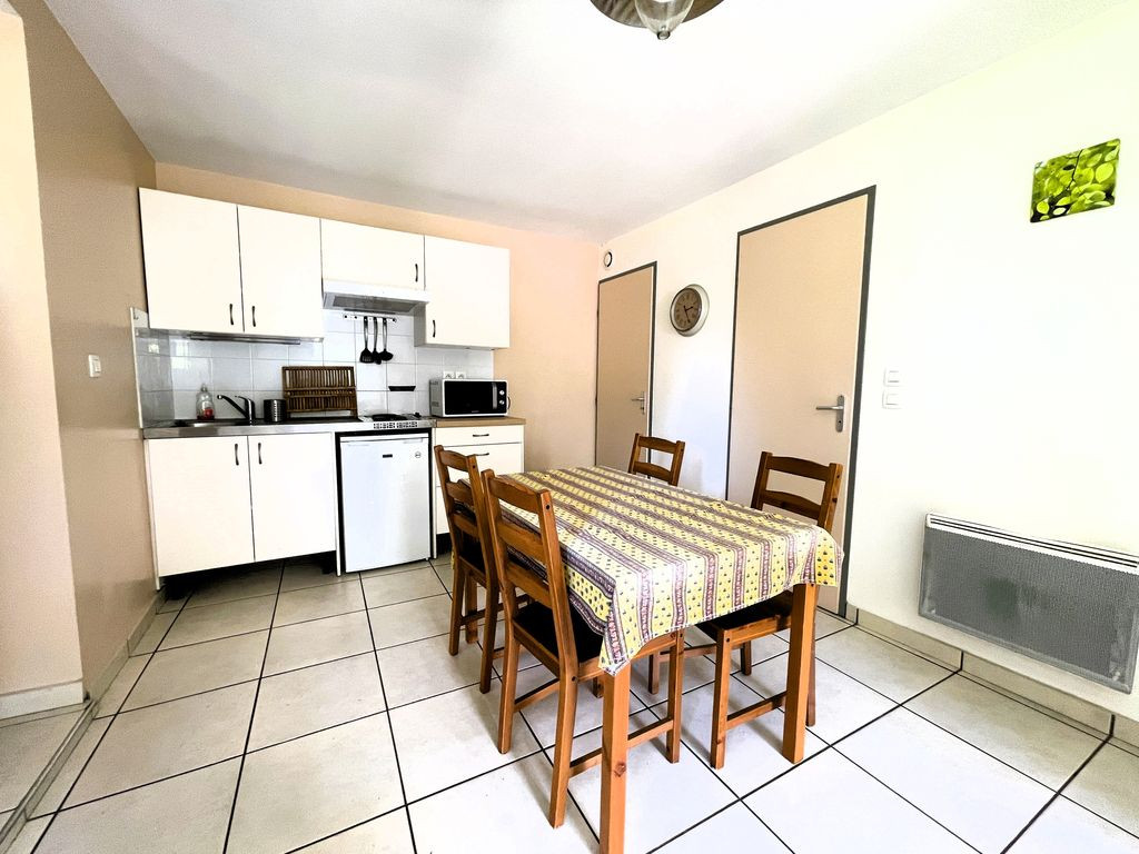 Propriété composée de 4 appartements + Terrain + Garage