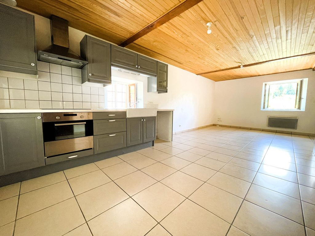 Propriété composée de 4 appartements + Terrain + Garage